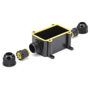 Schwarze S-Impuls Abzweigdose IP68 für Außenbereich mit gelben Dichtungen und Zubehör.