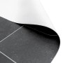 Dunkelgrauer PVC-Boden Tronto Fliese Palermo in Fliesenoptik, Ecke hochgerollt. Strapazierfähig, schalldämmend.