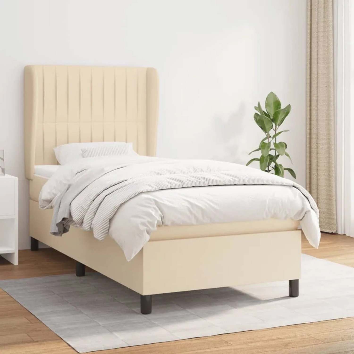 Cremefarbenes vidaXL Boxspringbett (90x200 cm) mit Matratze und hohem Kopfteil.