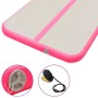Detailansicht der rosa-grauen aufblasbaren Gymnastikmatte aus PVC mit Ventil und Pumpe. Sport & Fitness.