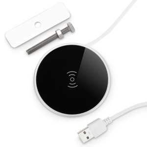 Rundes, schwarzes SOTECH JUNKER Einbau Wireless Charger mit Qi-Symbol, USB-Kabel und Montagezubehör für Smartphones.