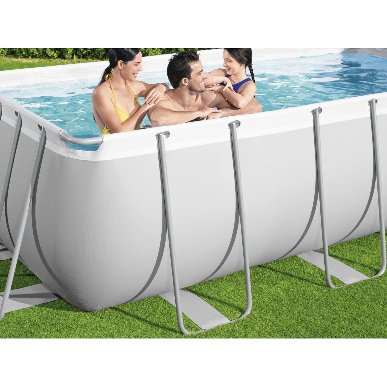 Rechteckiger Bestway Stahlrahmenpool 404x201x100 cm mit Familie im Wasser.