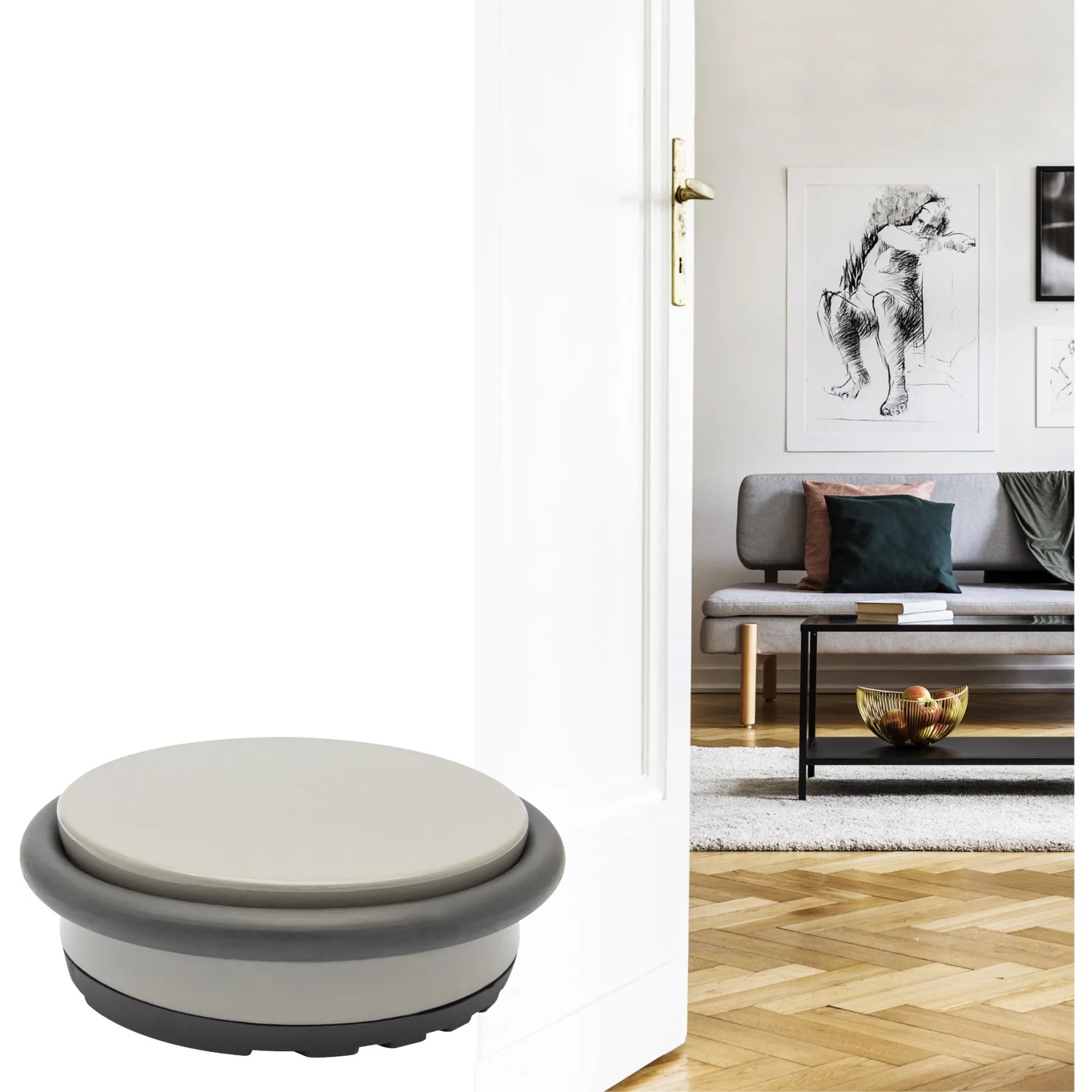 Wagner Bodentürstopper Big Disk Color steingrau zum Hinstellen vor einer Tür.