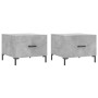 2er Set Couchtische in Betongrau, 50x50 cm, mit Schubladen und schwarzen Metallbeinen.