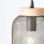 Olivgrüne Brilliant Pendelleuchte Giada Ø 16cm mit Holzdetail und Metallgitter.