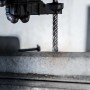 Bosch Expert Hammerbohrer SDS Plus-7X (8 mm) im Einsatz an einer Bohrmaschine.