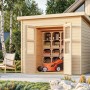 Karibu Holz-Gartenhaus Neuenburg mit geöffneten Türen, Rasenmäher und Regalen im Inneren.