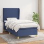 Blaues Boxspringbett 90x190 cm mit Matratze und Stoffbezug.