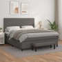 Graues Boxspringbett mit Matratze, Kopfteil und Bank aus Kunstleder, 180x200 cm.