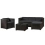 Schwarze Juskys Polyrattan Lounge Punta Cana L mit dunkelgrauen Bezügen, bestehend aus Sofa, Sessel, Hocker und Tisch.