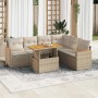 Beige 7-tlg. Garten-Sofagarnitur aus Rattan mit Akazientisch und cremefarbenen Kissen.