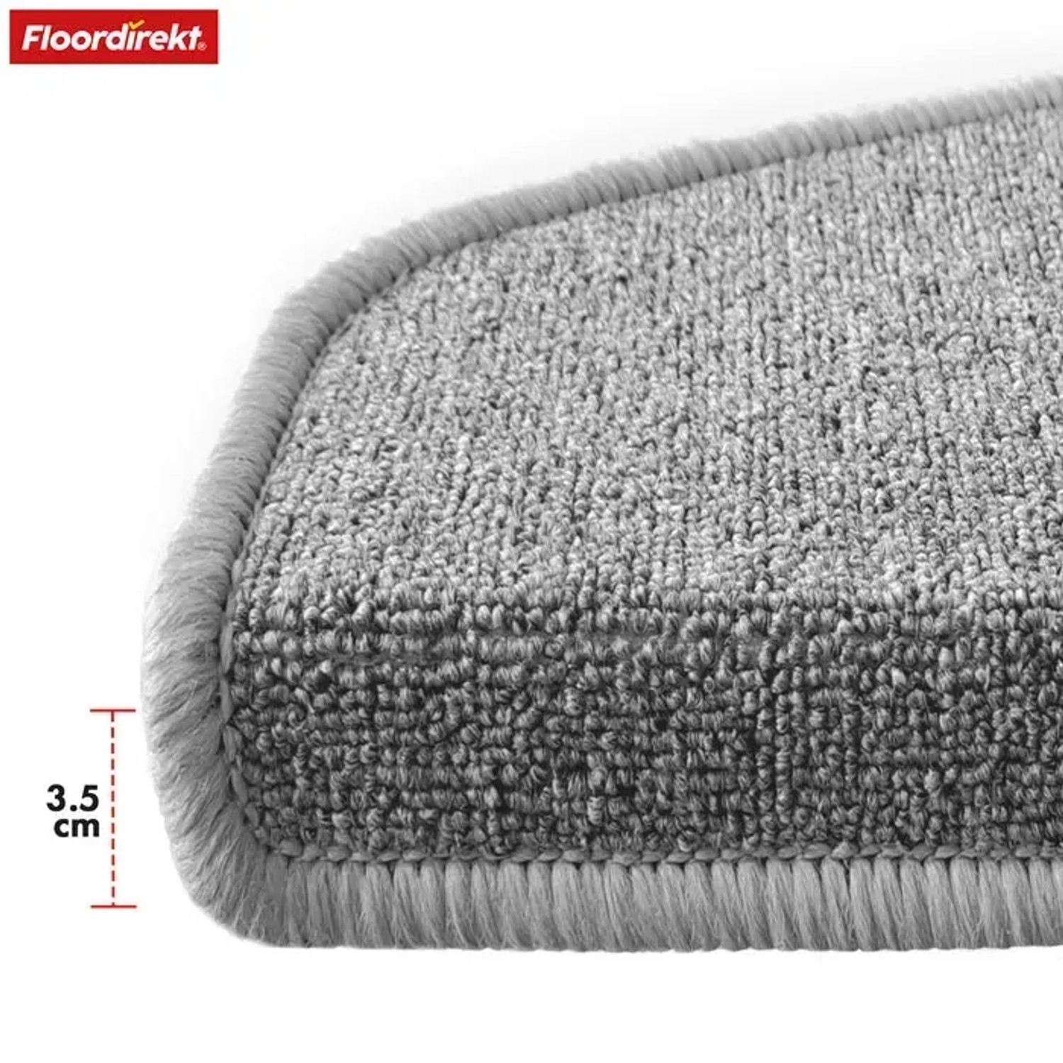 Detailaufnahme: Graue, halbrunde KARAT Stufenmatte London Pro mit geketteltem Rand und 3,5 cm hoher Lippe.