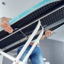 Leifheit Bügeltisch AirBoard Compact M Plus, Unterseite mit Gestell und Thermo-Reflect Bezug.