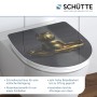Schütte WC-Sitz Relaxing Frog mit Absenkautomatik und Frosch-Motiv auf einem weißen WC.