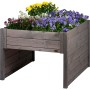 Dobar Mährobotergarage mit Pflanzkasten, grau, bepflanzt mit bunten Blumen.