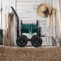 Fahrbarer Relaxdays Schlauchwagen aus schwarzem Stahl mit grüner Schlauchtrommel und Kurbel im Garten.