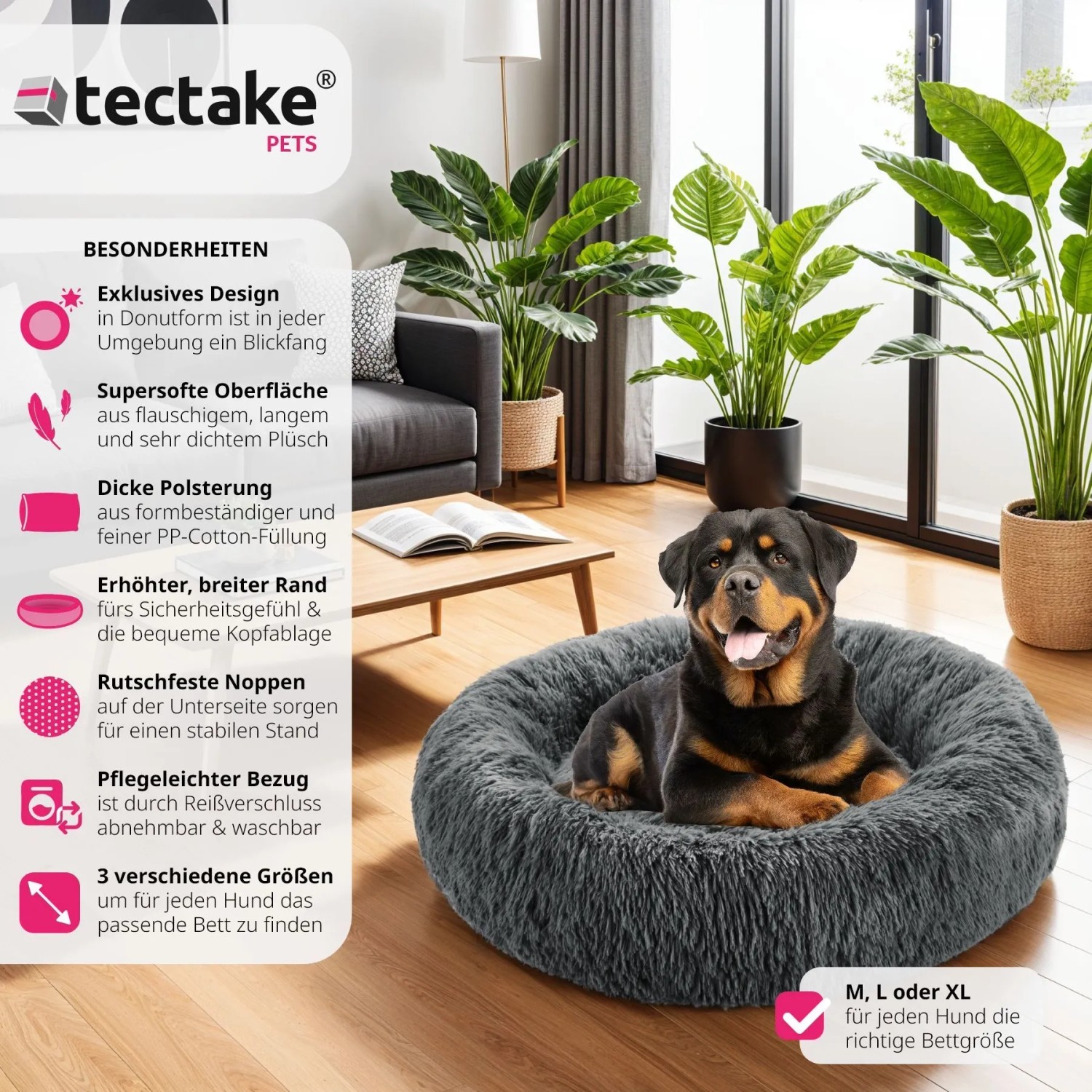Graues, rundes Tectake Hundebett Maja mit Plüschrand und einem Rottweiler Hund darin.
