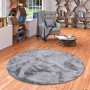 Runder, grau melierter Fellteppich (120x120cm) der Marke Pergamon. Super Soft und luxuriös.