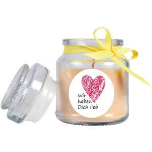 Gelbe Duftkerze im Glas mit Herz und Schleife, "Wir haben Dich lieb".