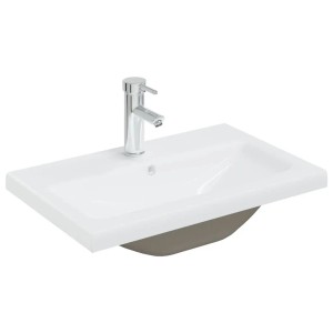 Weißes Keramik Einbauwaschbecken mit modernem Chrom-Wasserhahn, 61x39 cm. Zeitloses Design für Ihr Badezimmer.