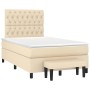 Cremefarbenes Boxspringbett 120x190 cm mit Matratze, Kopfteil und Bank.