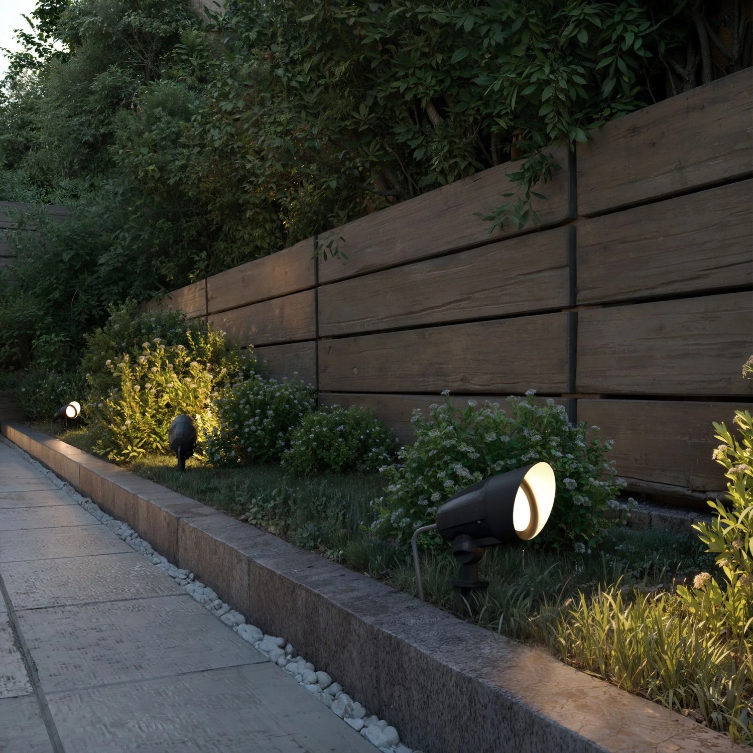 Schwarze Philips Cylr Erdspießleuchte als LED-Gartenstrahler im Außenbereich.