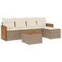 Beige 6-tlg. Garten-Sofagarnitur aus Polyrattan mit Kissen und Tisch.