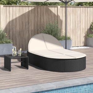 Schwarze Doppel-Sonnenliege aus Rattan mit cremefarbenen Kissen für den Garten.