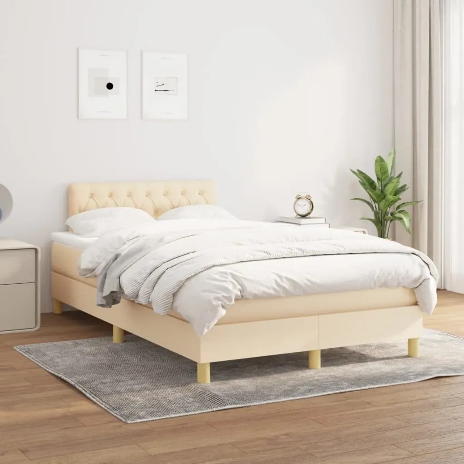 Cremefarbenes vidaXL Boxspringbett (120x200 cm) mit Matratze und Stoffbezug.