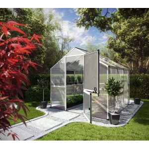 KGT Gewächshaus 5,15 m² mit geöffneter Tür im Garten, umgeben von Grün.