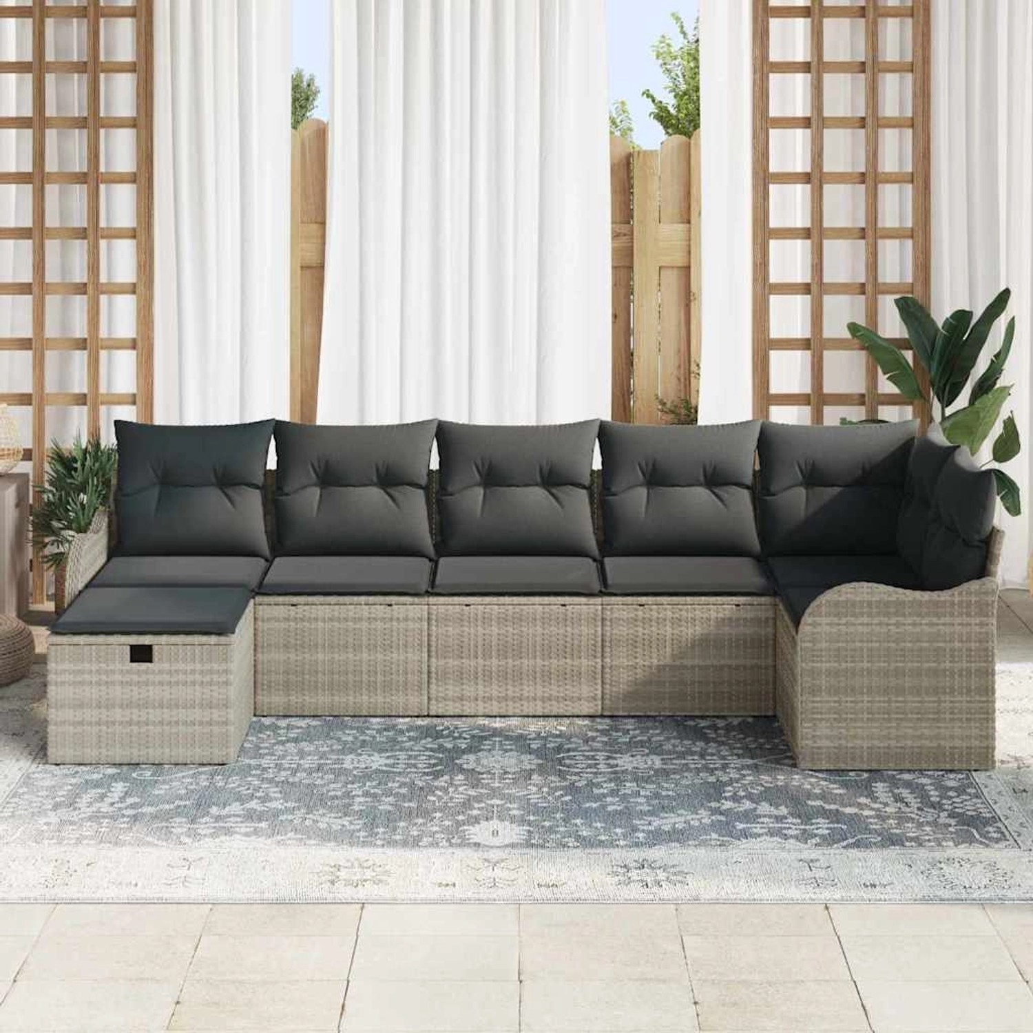 Hellgraues 7-teiliges vidaXL Garten-Sofa-Set aus Poly Rattan mit Kissen.