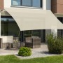 Rechteckiges, naturfarbenes Schneider Sonnensegel Teneriffa (500x360cm) über einer Terrasse mit Gartenmöbeln.
