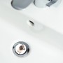Sanilo Waschbeckenstöpsel mit Mops-Motiv im weißen Waschbecken.