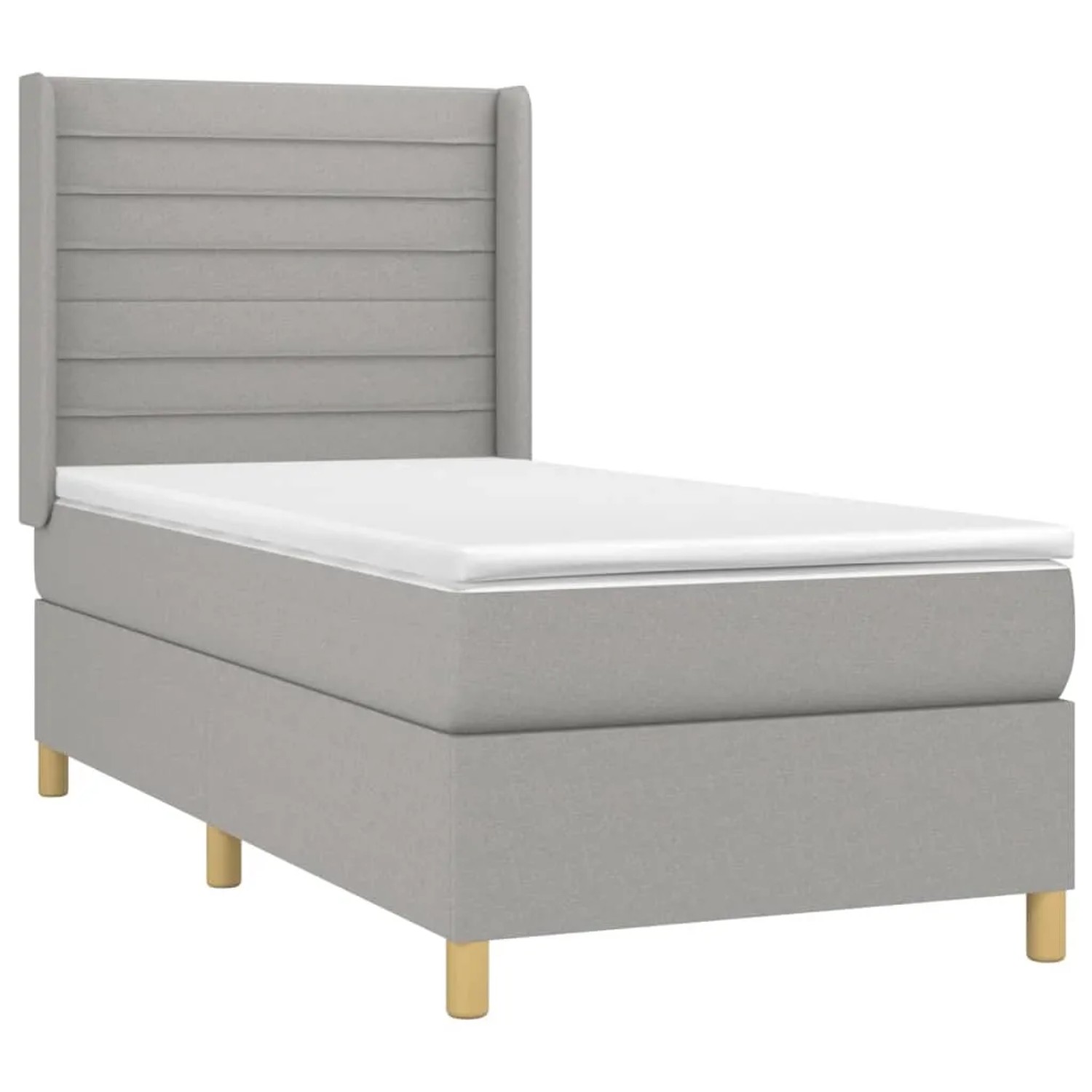 Helles Boxspringbett 90x190 cm mit Matratze und Kopfteil, Stoffbezug.