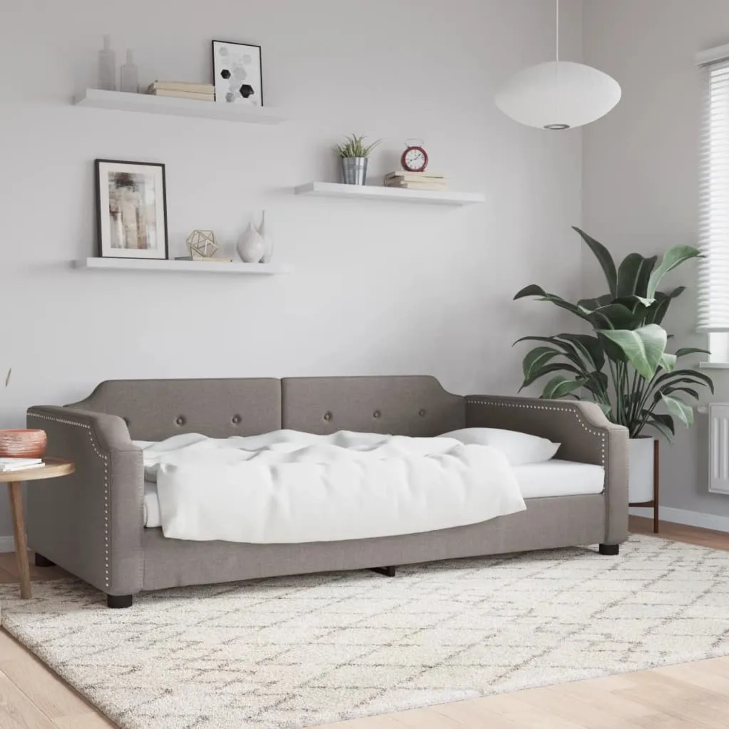 Graues vidaXL Tagesbett (80x200 cm) mit Stoffbezug im Wohnzimmer.