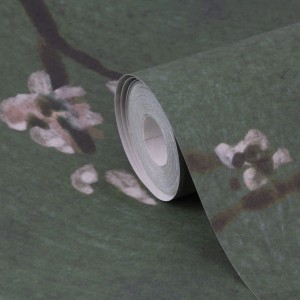 Fototapete Chinese bloesem groen: Rolle mit grünem Hintergrund und weißen Kirschblüten.