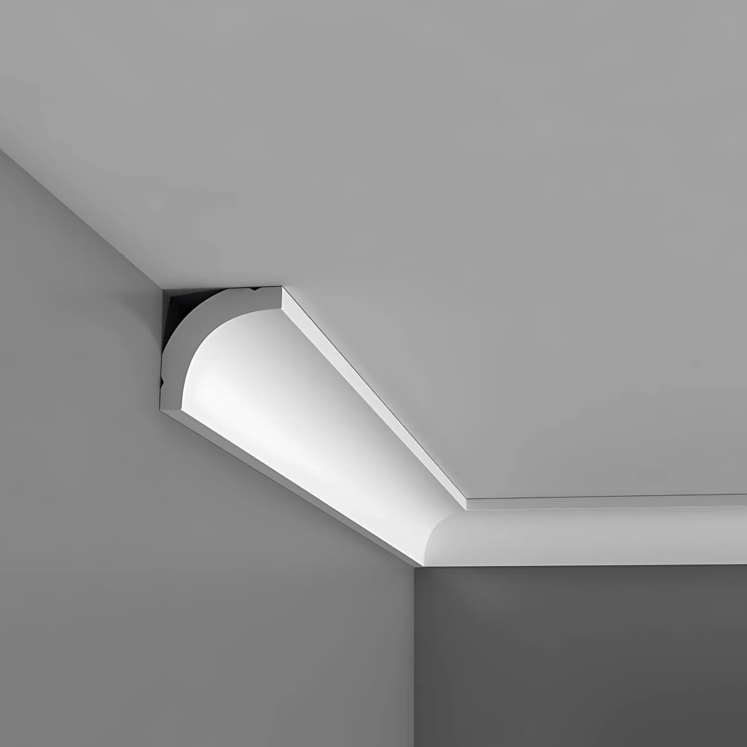 Weiße ORAC DECOR Zierleiste CB520N als Eckprofil an Wand und Decke.