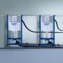 Grohe QuickFix Vorwandelement Solido für WC, 1,13m Bauhöhe, mit blauem Rahmen und Spülkasten.