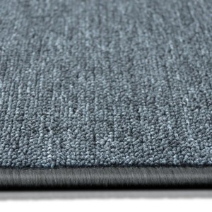 Detailaufnahme: Dunkelgrauer, runder KARAT Teppich London mit Schlingenflor und Umkettelung.