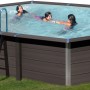 Ovaler Gre Composite Pool Avantgarde (524x386x124 cm) mit Leiter und Badenden im Garten.