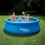 Blauer Summer Waves Quick-Up Pool (Ø 305 cm) mit Familie im Garten.