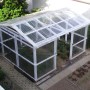 Gewächshaus mit klarer PVC-Profilplatte Sinus 76/18 Kunststoffbedachung.