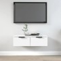 Weißer vidaXL Wandschrank (68x30x20 cm) aus Holzwerkstoff als TV-Schrank im Wohnzimmer.