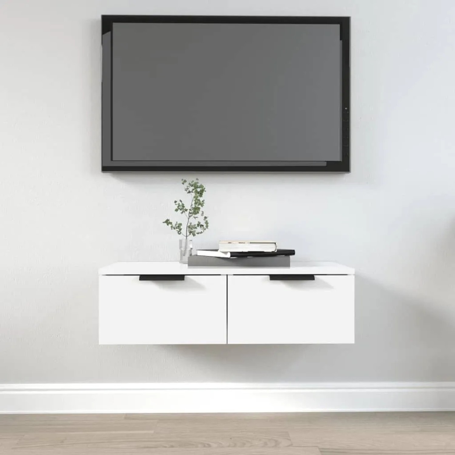 Weißer vidaXL Wandschrank (68x30x20 cm) aus Holzwerkstoff als TV-Schrank im Wohnzimmer.