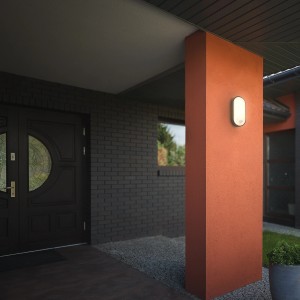 Schwarze Briloner LED Wandleuchte mit Bewegungsmelder an einer Hauswand.