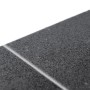 Nahaufnahme des Primaflor PVC Tronto Fliesen Bodenbelags Palermo in Dunkelgrau mit strukturierter Fliesenoptik und Fuge.
