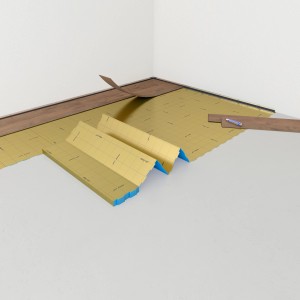 Verlegung der Selitbloc® GripTec Trittschalldämmung unter einem Holzboden. Goldene Dämmplatten mit blauem Rand.