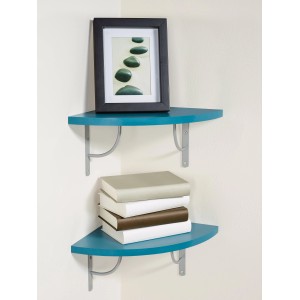 OBI Eckwandregal Monteux in Petrol mit Deko und Büchern an einer weißen Wand.