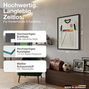 Schwarzer Echtholz Trikotrahmen 50x70 cm mit Fanshirt an der Wand. Ideal für Kindertrikots.