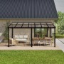 Sojag Terrassenüberdachung St. Barth, anthrazit, mit Möbeln auf Terrasse.